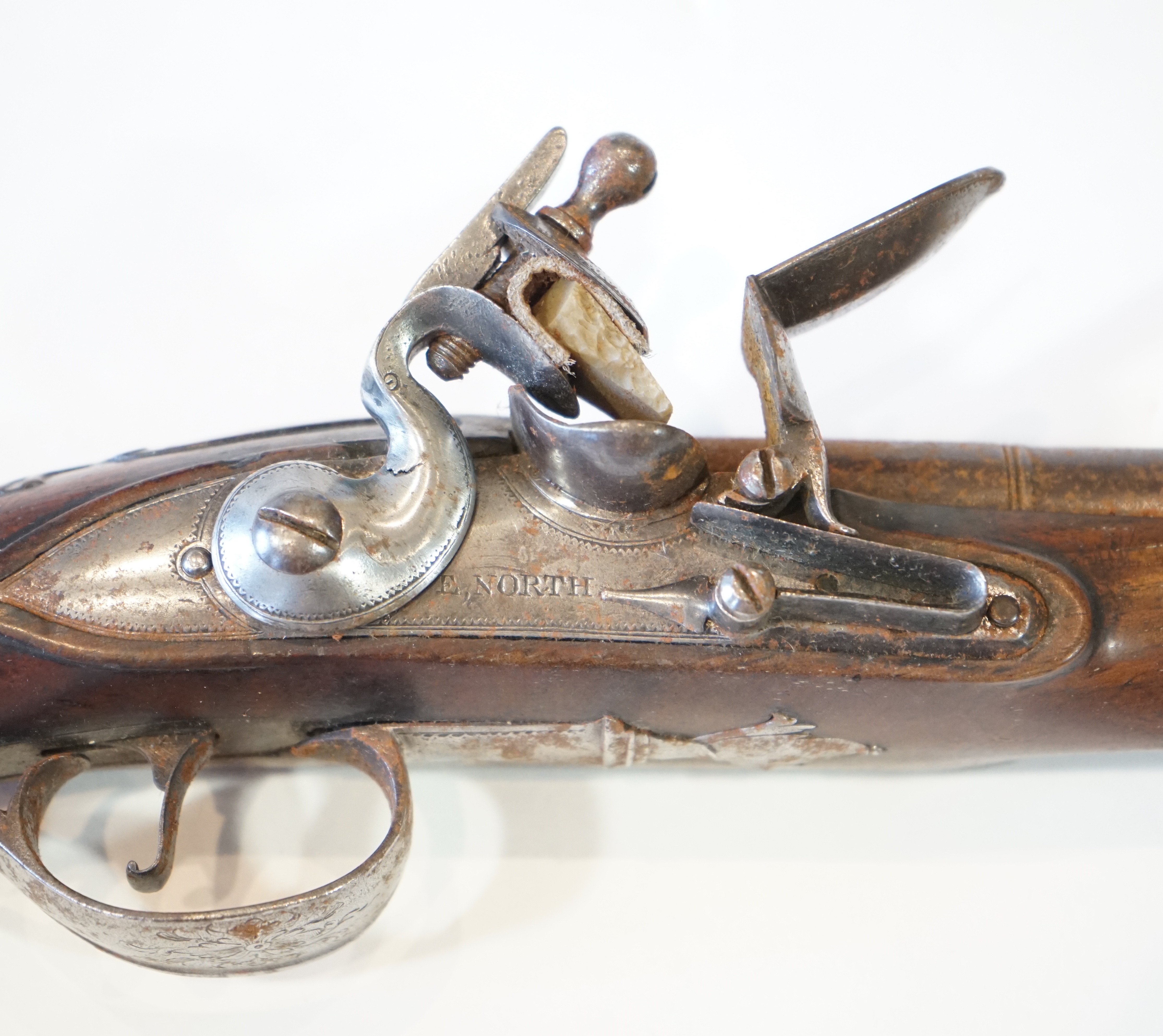 A partly silver mounted flintlock holster pistol by E. North of London, c.1760